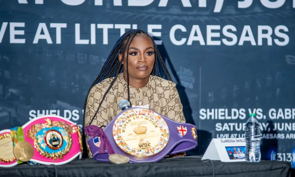 Claressa Shields celebrating after a championship boxing victory in 2026