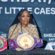 Claressa Shields celebrating after a championship boxing victory in 2026